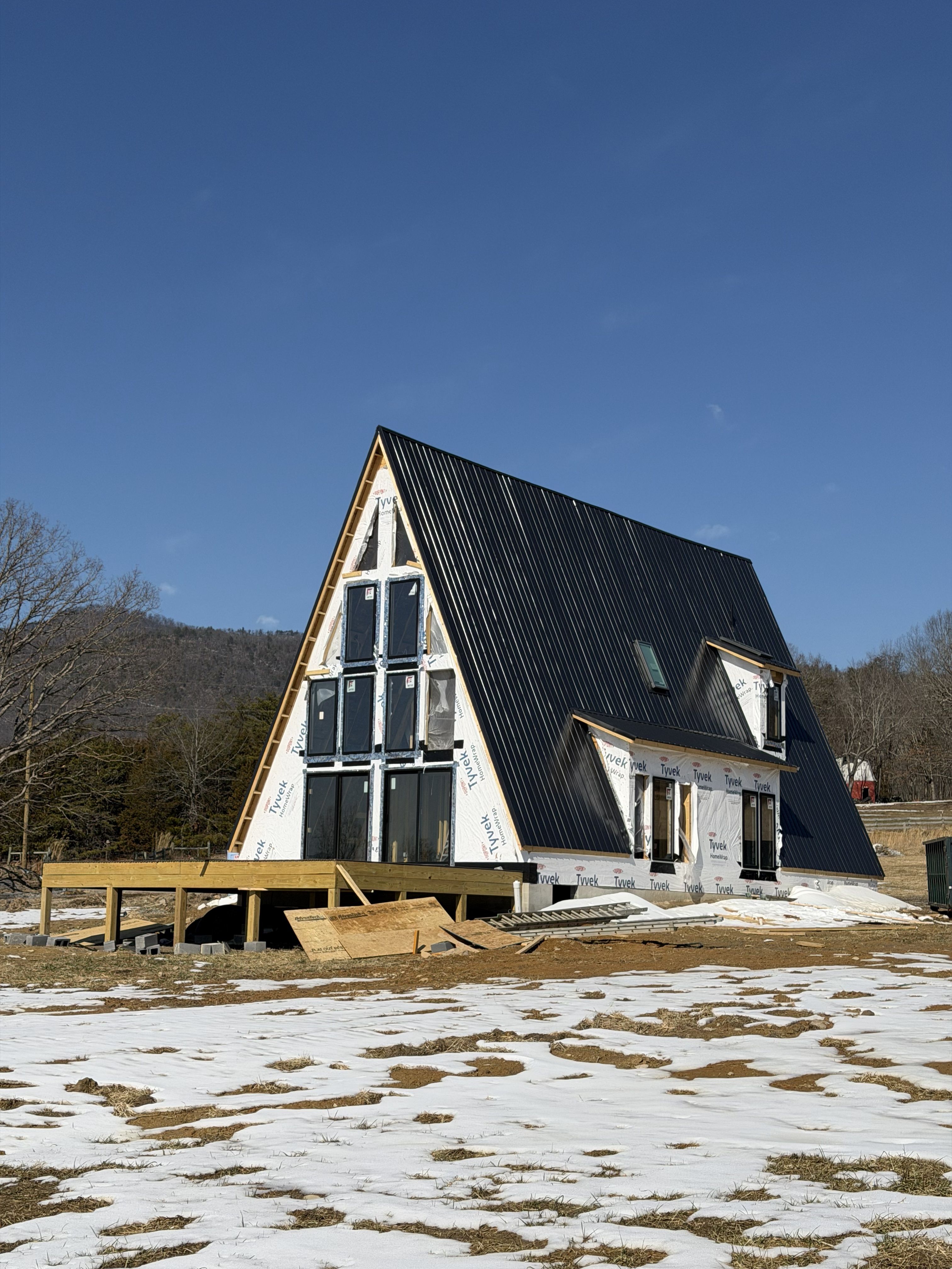 A-frame side view with mountains