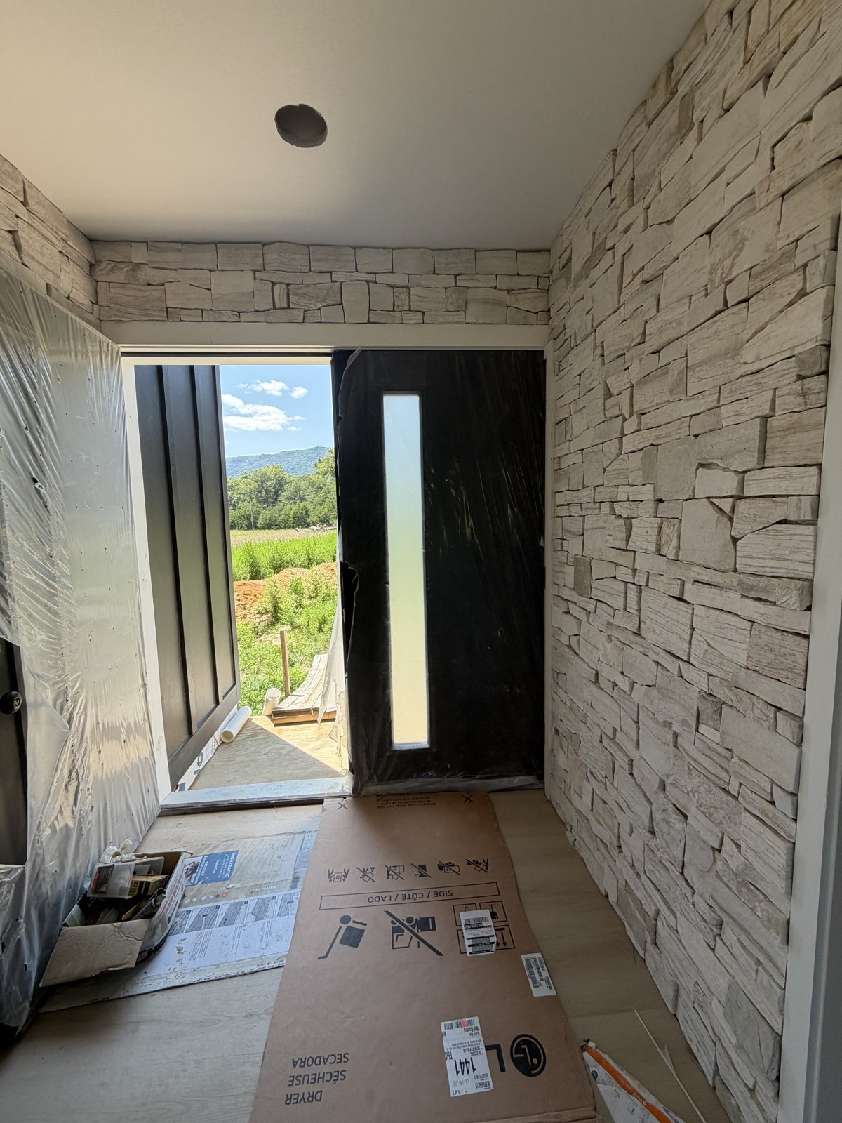 HOM Villas stacked-stone entry foyer