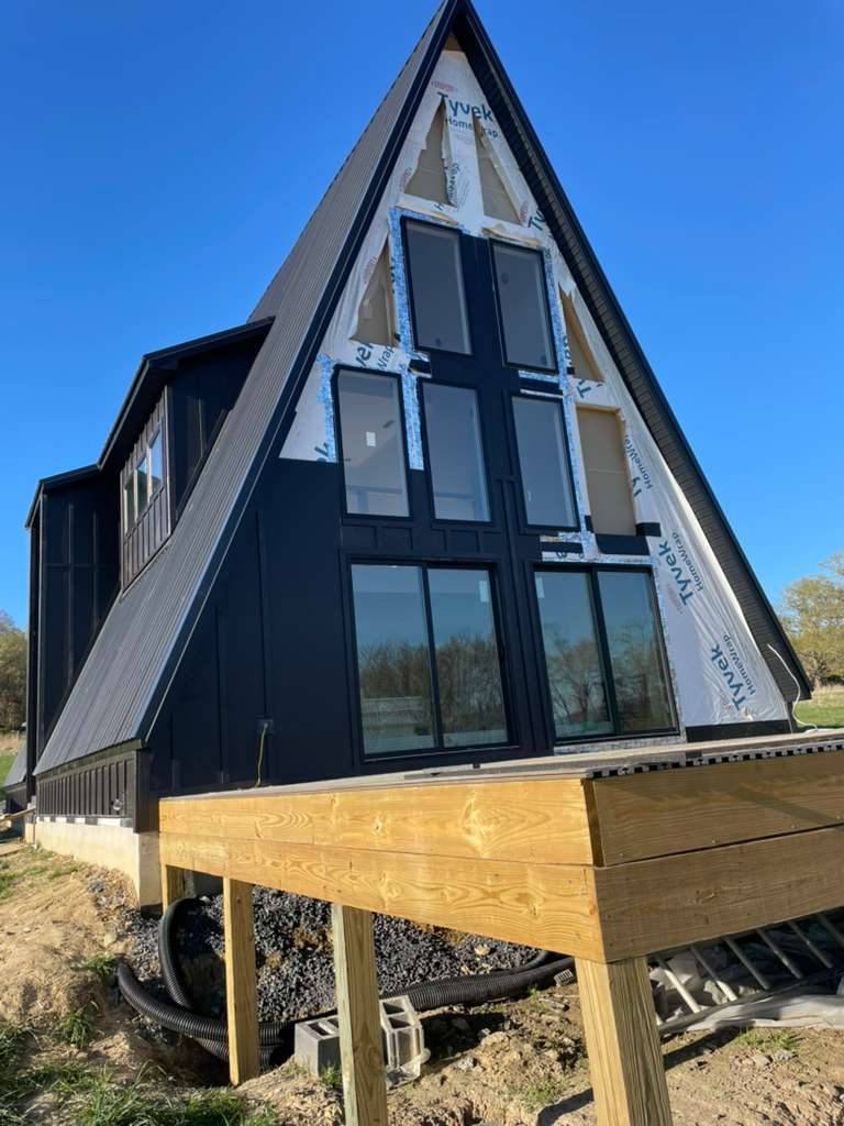 Front A-frame with siding underway